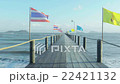 Wooden jetty on tropical beach 22421132