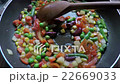 Fresh vegetables with frying in a pan. Slow motion 22669033