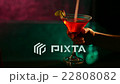 Cinemagraph of person mixing cocktail with straw 22808082