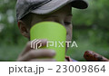 Boy on Picnic Drinks From a Plastic Cup 23009864