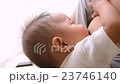 Mother breastfeeding her newborn baby 23746140
