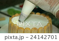 Confectioner Makes a Cake 24142701