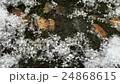 Large snowflakes fall on the track 24868615