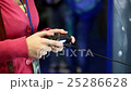 Woman with joystick 25286628