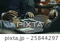 Old man playing dominoes. Close up 25844297