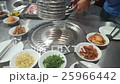 Hands cooking for a group of friends to eat barbec 25966442