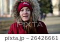 Cheerful Girl Sends a Kiss With a Funny Face and 26426661