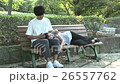 A couple to relax on a bench 26557762