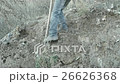 A man digging earth from the mountain 26626368