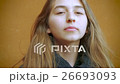 A young girl smiles and laughs modestly in slow mo 26693093