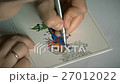 Woman coloring an anti stress mandala closeup 27012022