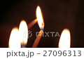 Hand holding a candle, going to burn a candle in 27096313