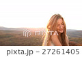 Beautiful woman at sunset 27261405