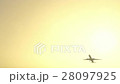 Commercial airline plane flying by overhead on 28097925
