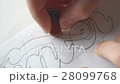 Designer drawing letters with pencil 28099768