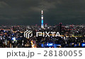 [Zoom out] Clouds in the night sky covering the Sky Tree and the surrounding cityscape 28180055
