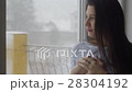 Sexy Girl Mysteriously Looks at Snowing 28304192