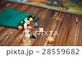 Dices Fall On a Wooden Table From Bag 28559682