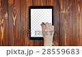 A Finger Swipes On a Tablet Screen With Alpha 28559683