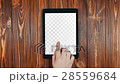 A Finger Swipes On a Tablet Screen With Alpha 28559684