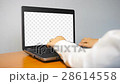 Businesswoman Typing On a Laptop Computer With an 28614558
