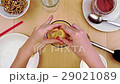 Squeezing lemon juice into the blender for a 29021089