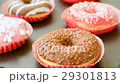 Sweet donuts on the black background 29301813