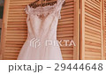 Beautiful luxurious wedding dress on hanger on 29444648