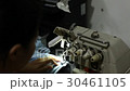 Closeup shot of sewing machine 30461105