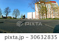 boy learns to ride a skateboard 30632835