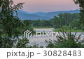Tourist tents. Sunset, Spring flood in the river 30828483