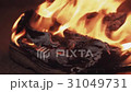 Burning boots on the sand at coast strong bright 31049731