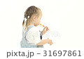 Little girl is holding a sweet candy in her hands 31697861