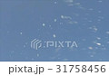 Water drops from the ocean waves in the air on the 31758456
