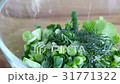 Adding salt to vegetable salad, close up video cli 31771322