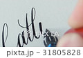 Calligrapher writing a word 31805828