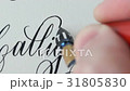 Calligrapher writing a word 31805830