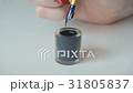 Calligrapher writing a word 31805837