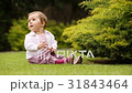 Cute little baby-girl learning to crawl on the 31843464