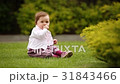 Cute little baby-girl learning to crawl on the 31843466