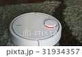 Robot vacuum cleaner on carpet floor, Smart 31934357