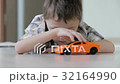 sad little boy lying on the floor at home 32164990