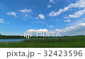 Fluffy white cloud over the lake. 32423596