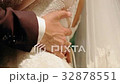 the groom embraces the bride 32878551