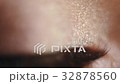 green teen girl eye closeup 32878560