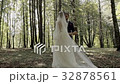 wedding dance of the bride and groom in the woods 32878561