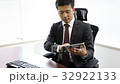 Businessman searching for on iPad 32922133