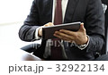 Businessman searching for on iPad 32922134