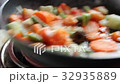 Fried vegetables in a frying pan 32935889