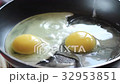 Breakfast just cooked with scrambled eggs in a 32953851
